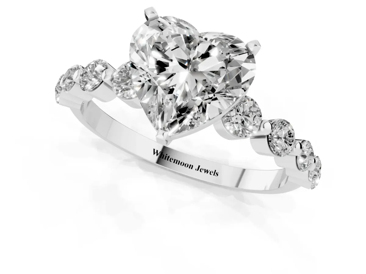 Heart Cut Solitaire Diamond Ring with Pave Band and Four-Prong Setting Silver