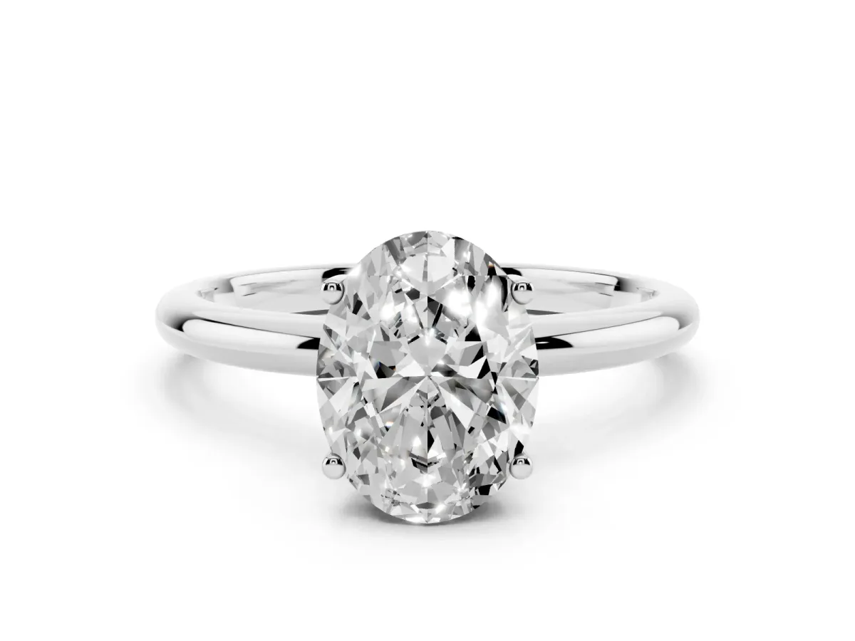 Oval Cut Cut Solitaire Engagement Ring with Four-Prong Setting and Classic Band Silver