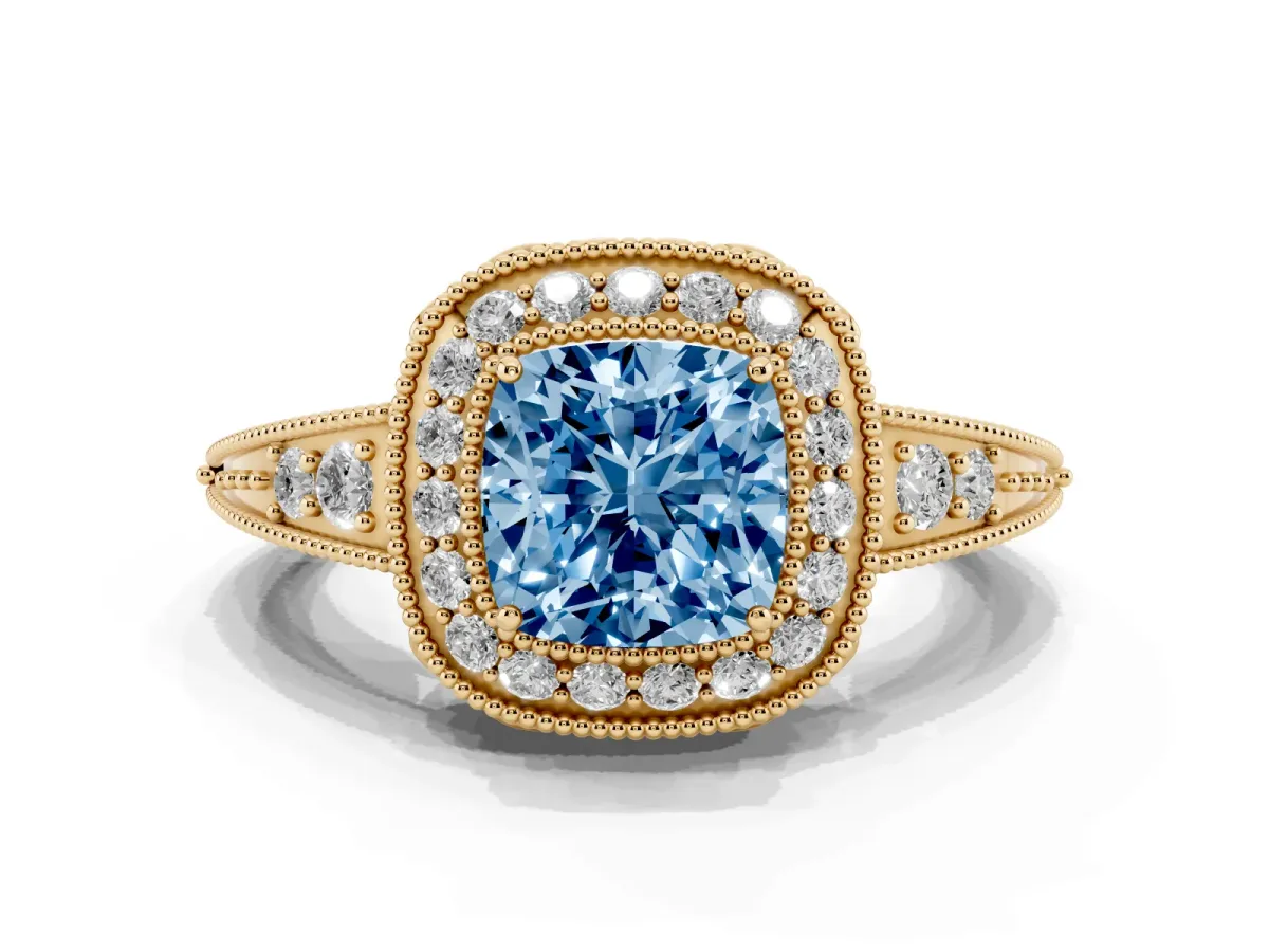 Fancy Blue Cushion Cut Halo Diamond Split Shank Ring with Milgrain Detail Yellow gold