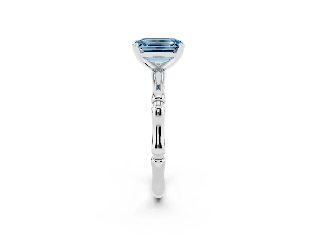 Fancy Blue Emerald Cut Solitaire Diamond Ring with Bamboo Band and Four-Prong Setting Platinum