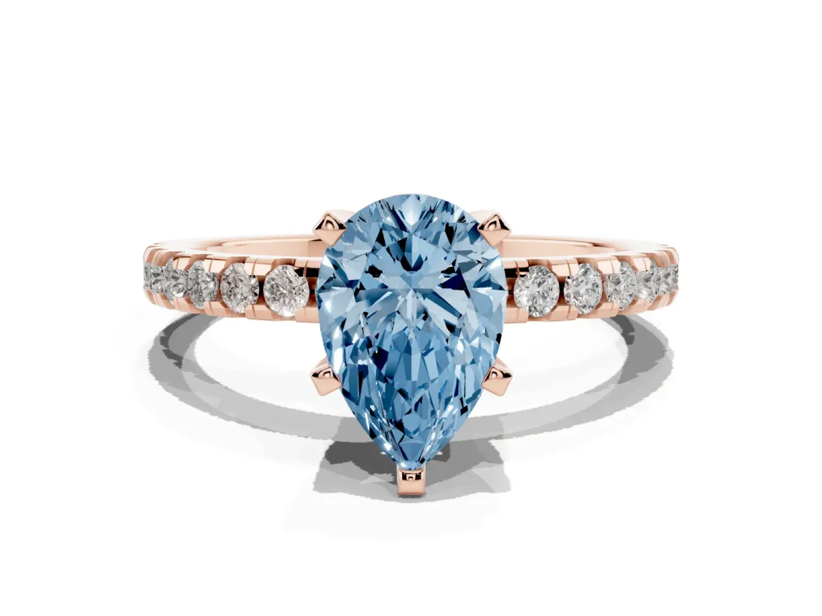 Fancy Blue Pear Cut Diamond Solitaire Ring with Round Pavé Band and Four-Prong Setting Rose gold