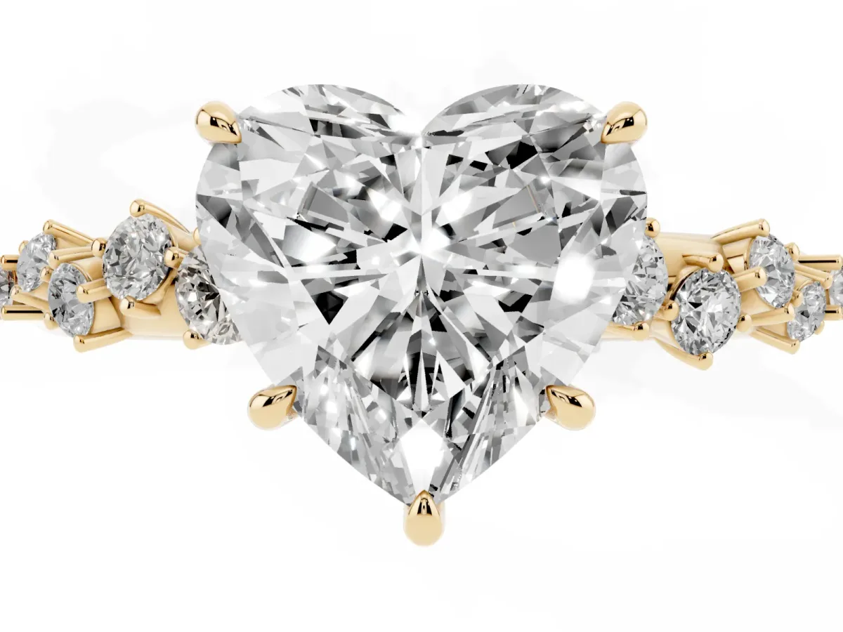 Heart Cut Diamond Cluster Side Stone Solitaire Ring with Prong Setting Yellow gold