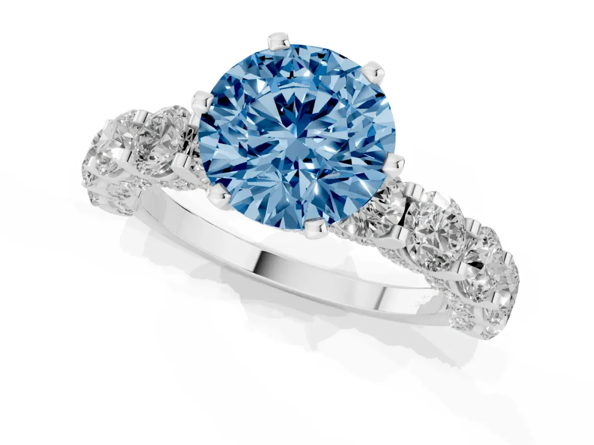 Fancy Blue Round Cut Diamond Side Stone Engagement Ring with Four-Prong Setting Silver