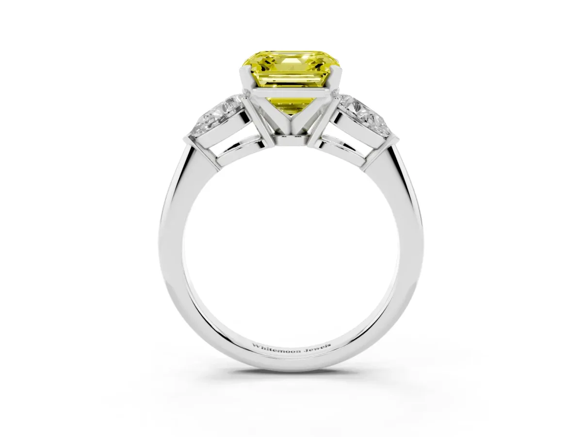 Fancy Yellow Three-Stone Asscher Cut Diamond Ring with Pear Side Stones and Four-Prong Setting Silver