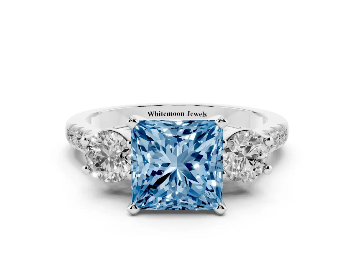 Fancy Blue Three-Stone Princess Cut Diamond Pavé Band with Four-Prong Setting Silver