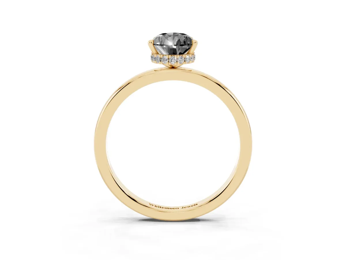 Fancy Black Pear Cut Solitaire Engagement Ring with Cathedral Band and Four-Prong Setting Yellow gold