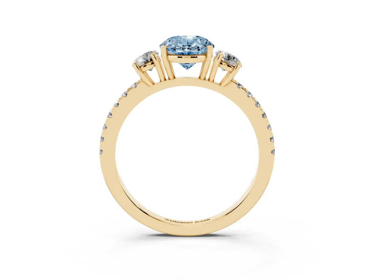 Fancy Blue Three-Stone Oval Cut Cut Diamond Pavé Band with Prong Setting Yellow gold