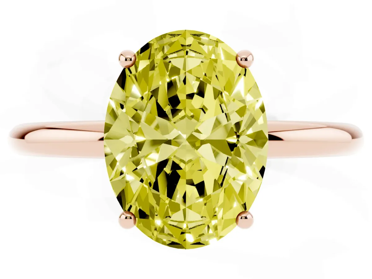 Fancy Yellow Oval Cut Solitaire Diamond Ring with a Classic Band and Four-Prong Setting Rose gold