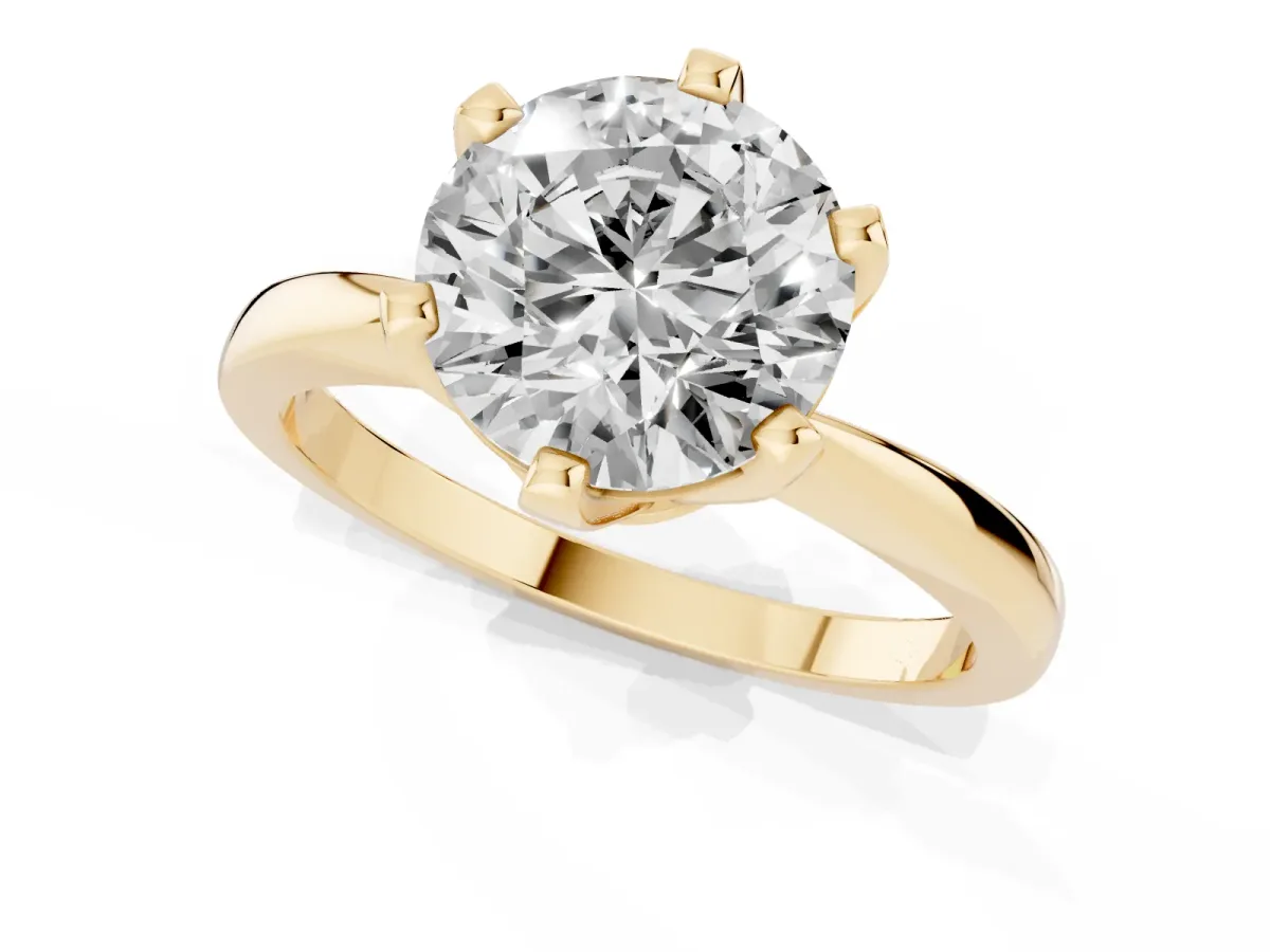 Round Cut Solitaire Engagement Ring with Six-Prong Setting and Tapered Band Yellow gold