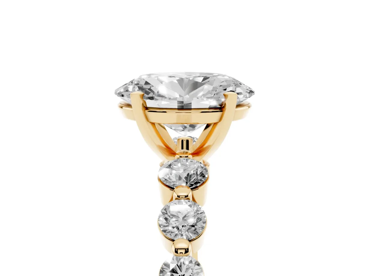 Oval Cut Solitaire Diamond Ring with Pave Band and Four-Prong Setting Yellow gold