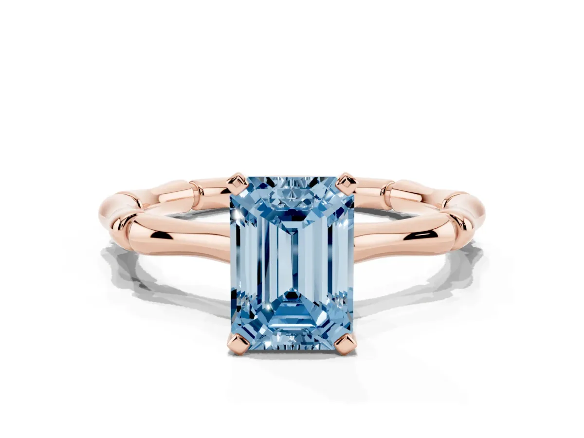 Fancy Blue Emerald Cut Solitaire Diamond Ring with Bamboo Band and Four-Prong Setting Rose gold
