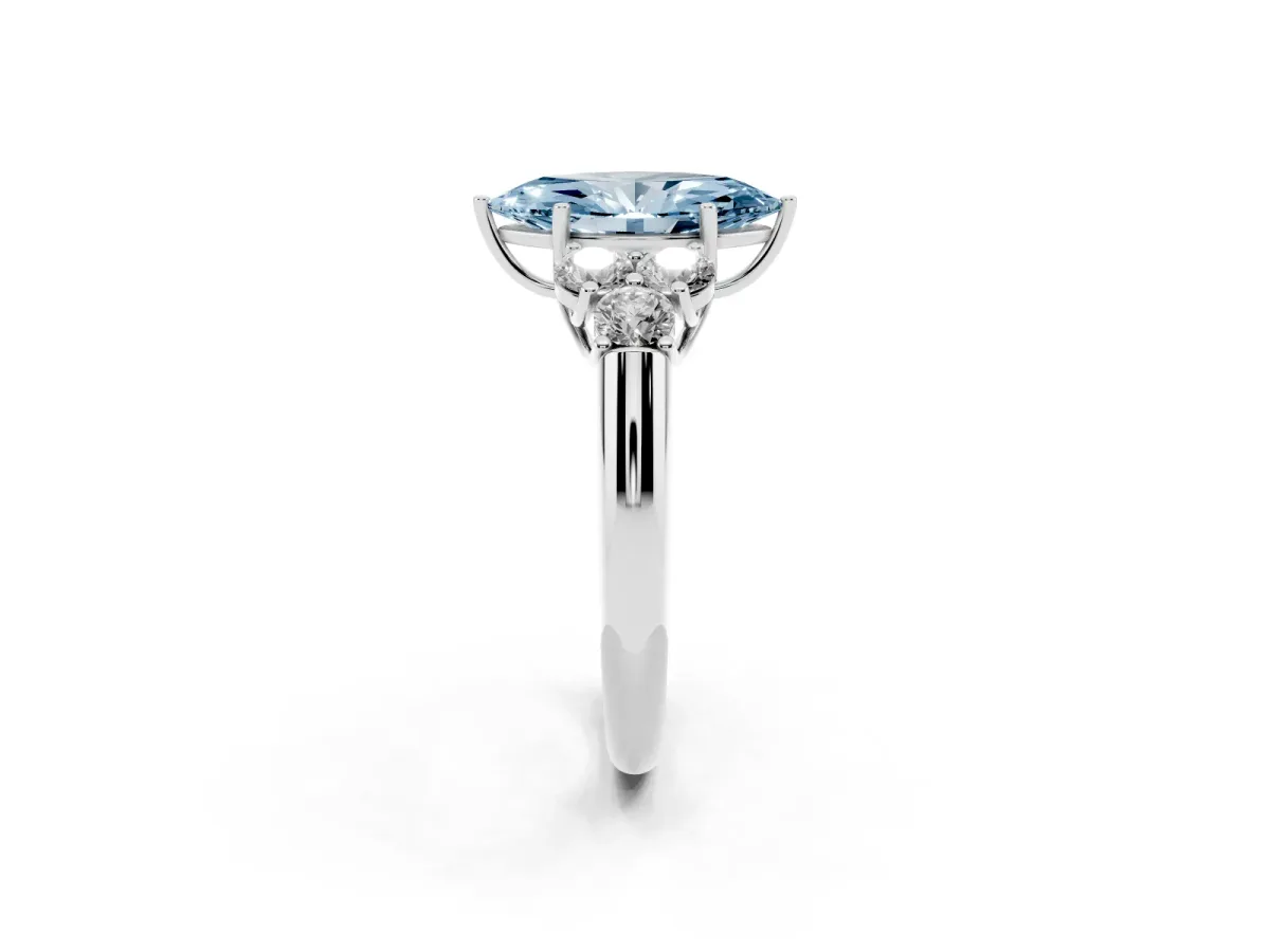 Fancy Blue Marquise Cut Cut Diamond Cluster Ring with Round Accent Stones and Prong Setting on a Classic Band Platinum