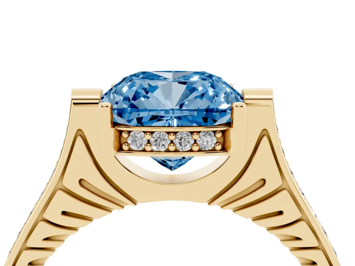 Fancy Blue Cushion Cut Solitaire Diamond Ring with Channel Set Band and Bezel Prong Setting Yellow gold