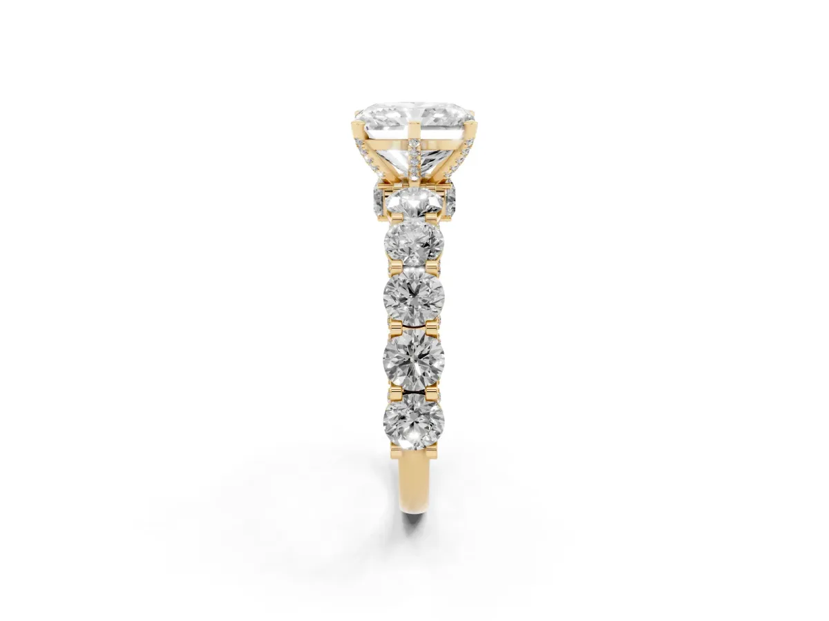 Radiant Cut Diamond Side Stone Engagement Ring with Four-Prong Setting Yellow gold