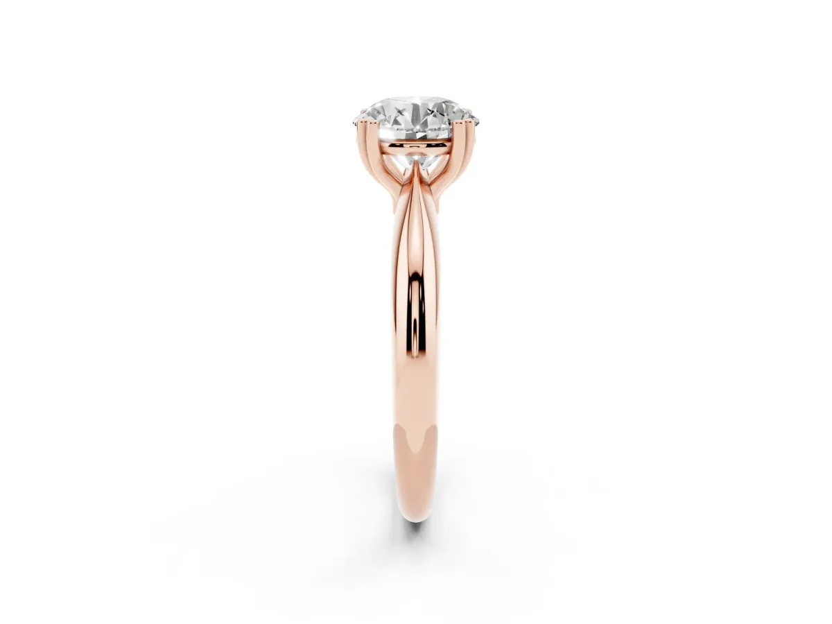Round Cut Cut Solitaire Engagement Ring with Tapered Band and Four-Prong Setting Rose gold