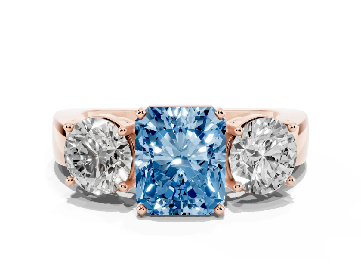 Fancy Blue Three-Stone Radiant Cut Diamond Ring with Round Side Stones, Classic Band, and Four-Prong Setting Rose gold