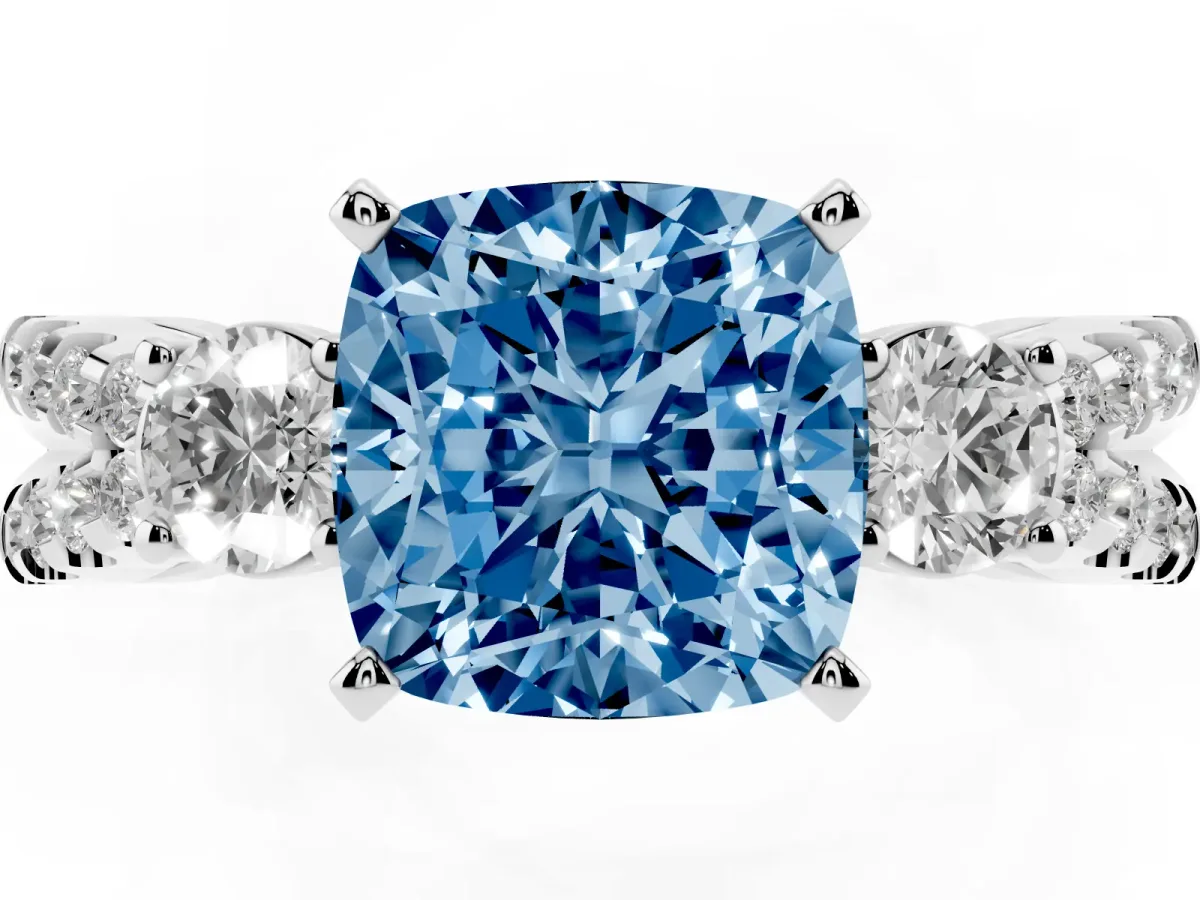Fancy Blue Cushion Cut Diamond Three-Stone Ring with Pavé Split Shank and Four-Prong Setting Silver