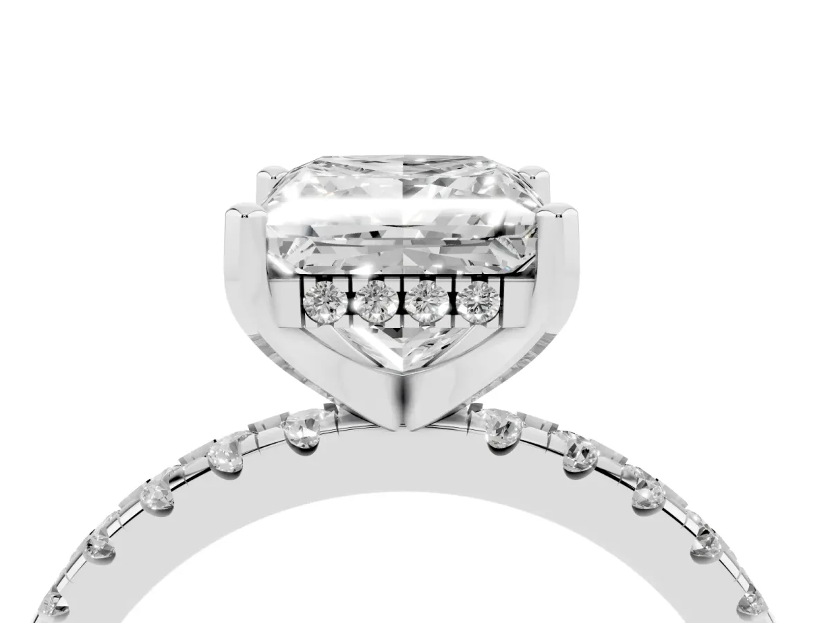 Princess Cut Diamond Solitaire Ring with Round Pavé Band and Four-Prong Setting Silver