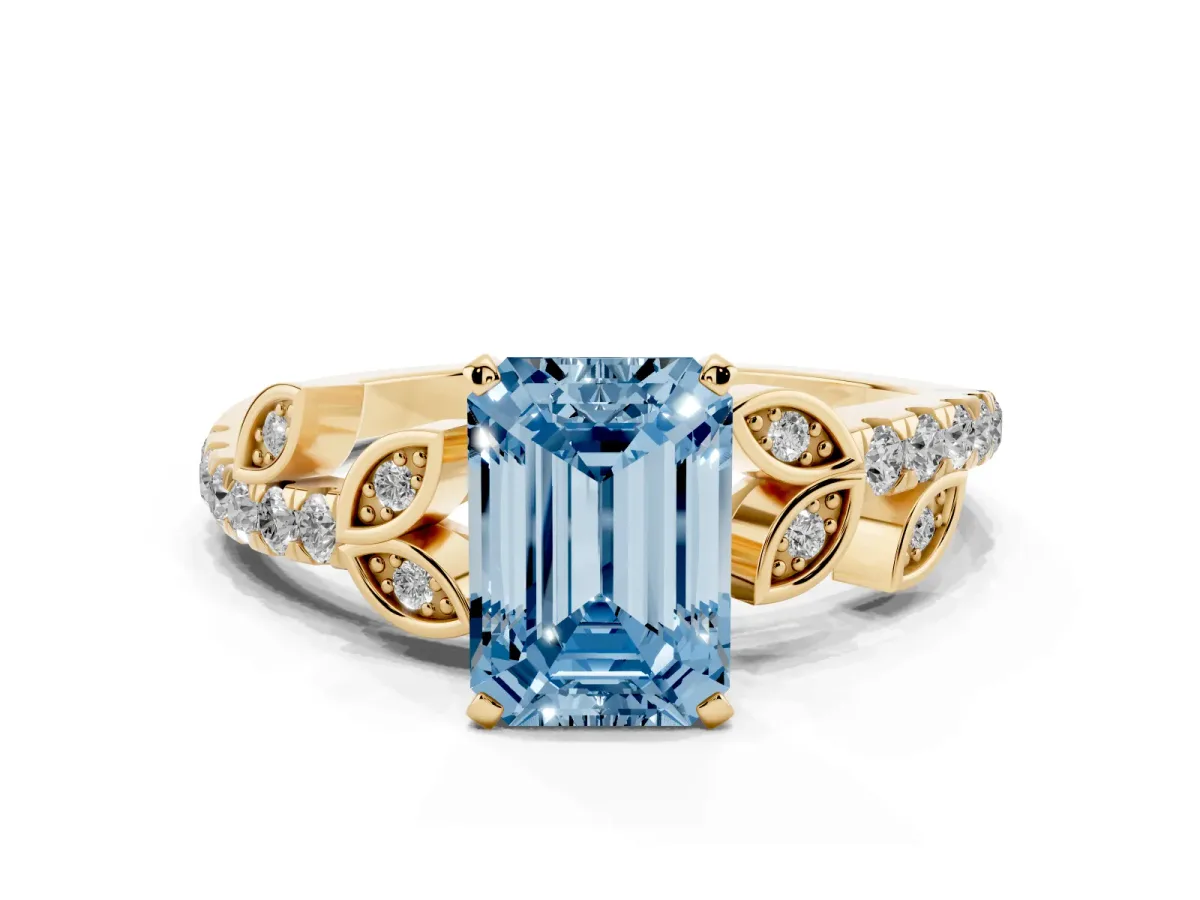 Fancy Blue Emerald Cut Solitaire Leaf-Inspired Diamond Ring with Pavé Band and Four-Prong Setting Yellow gold