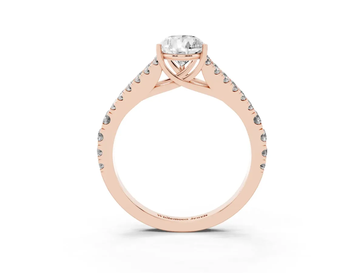 Pear Cut Diamond Split Shank Pavé Engagement Ring with Four-Prong Setting Rose gold