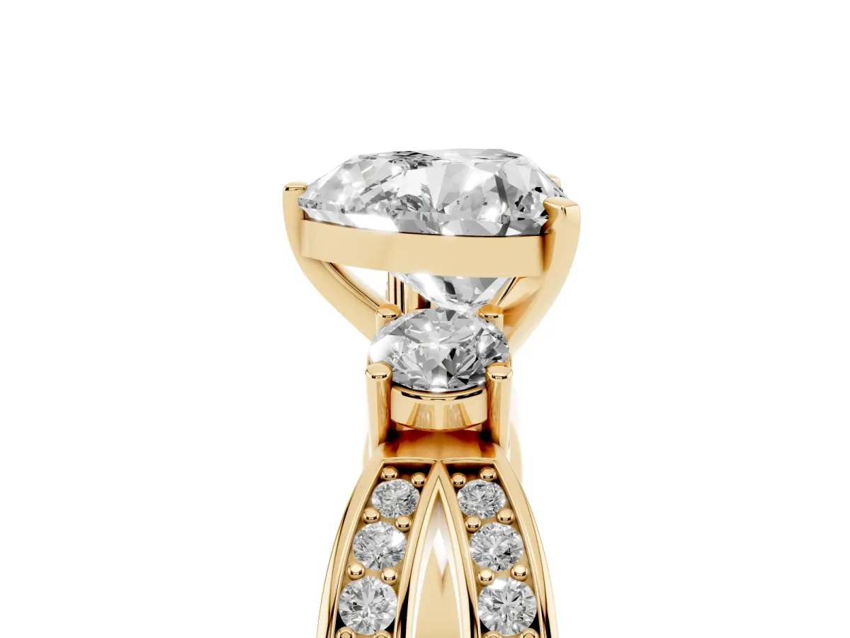 Three-Stone Heart Cut Cut Diamond Twist Band with Prong Setting Yellow gold