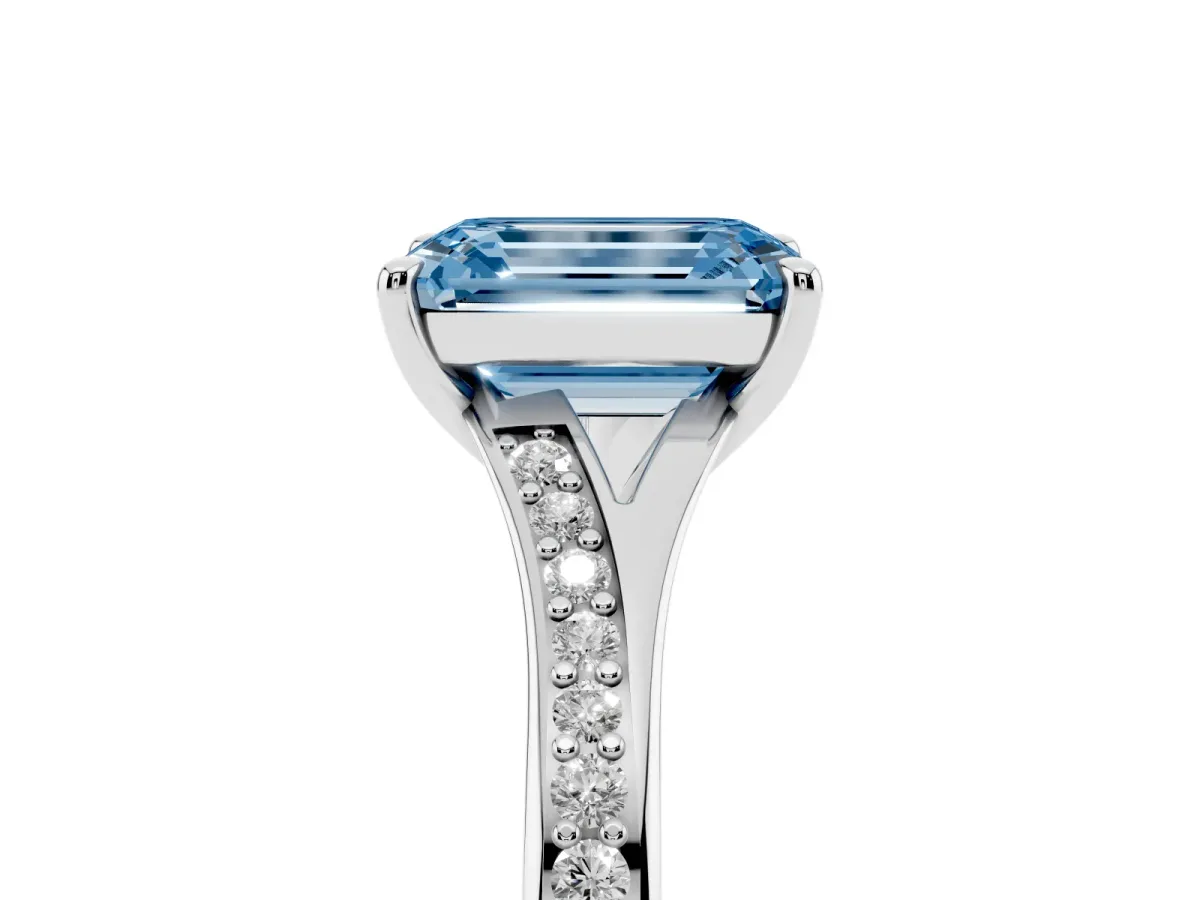 Fancy Blue Emerald Cut Diamond Solitaire Ring with Pavé Band and Prong Setting Platinum