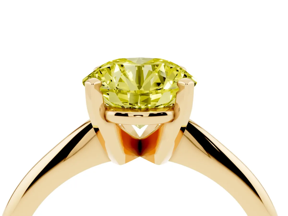 Fancy Yellow Round Cut Cut Solitaire Ring with Four-Prong Setting on a Classic Band Yellow gold
