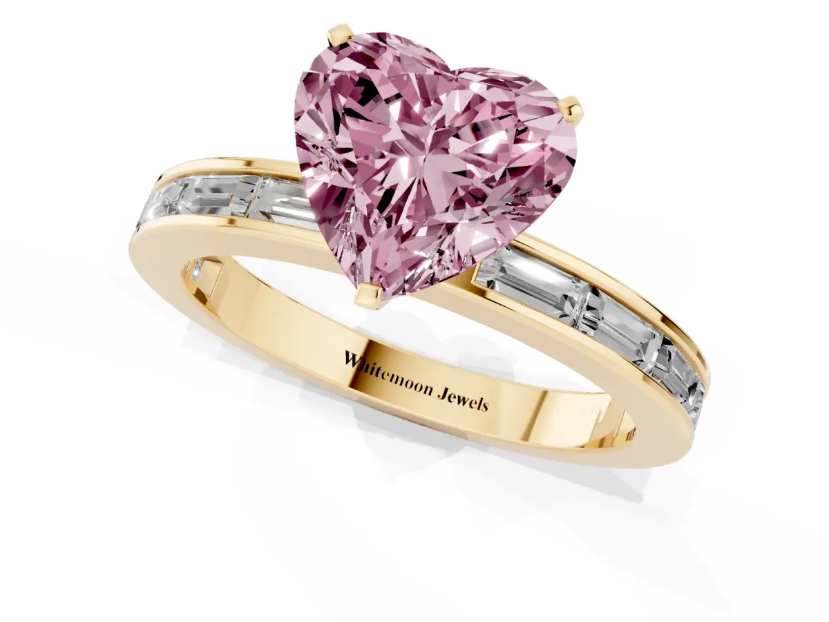 Fancy Pink Heart Cut Solitaire Diamond Ring with Channel-Set Baguette Band and Four-Prong Setting Yellow gold