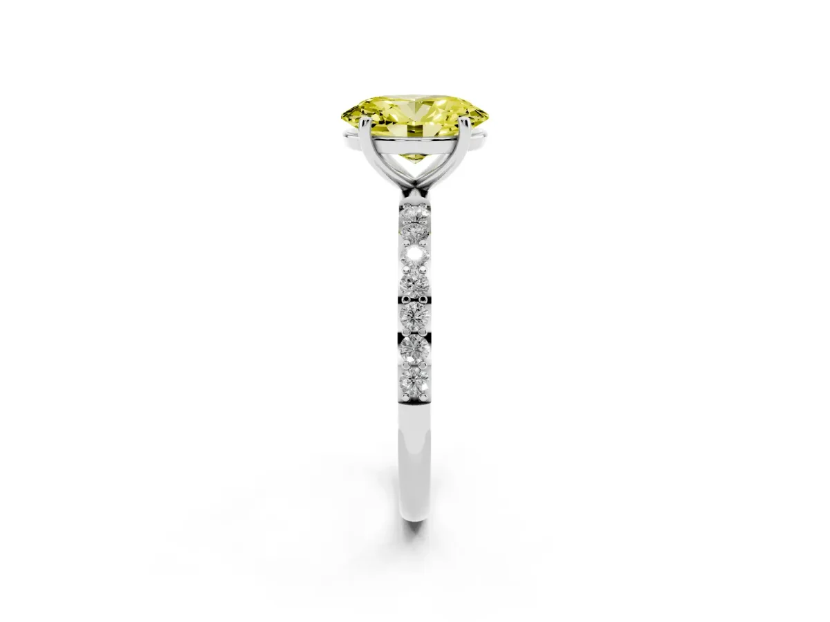 Fancy Yellow Oval Cut Diamond Solitaire Ring with Round Pavé Shoulders and Prong Setting Silver
