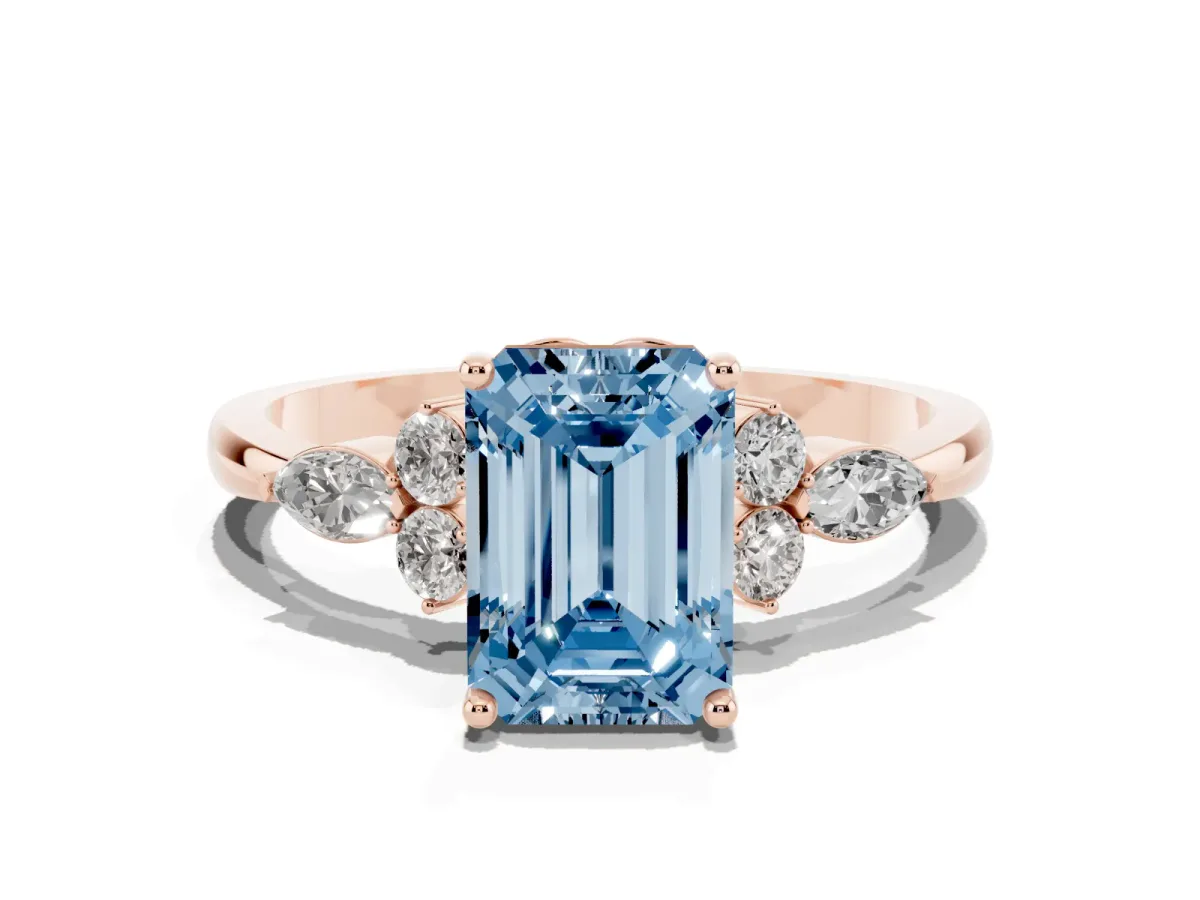 Fancy Blue Emerald Cut Brilliant Diamond Solitaire Ring with Pear Side Stones and Four-Prong Setting Rose gold
