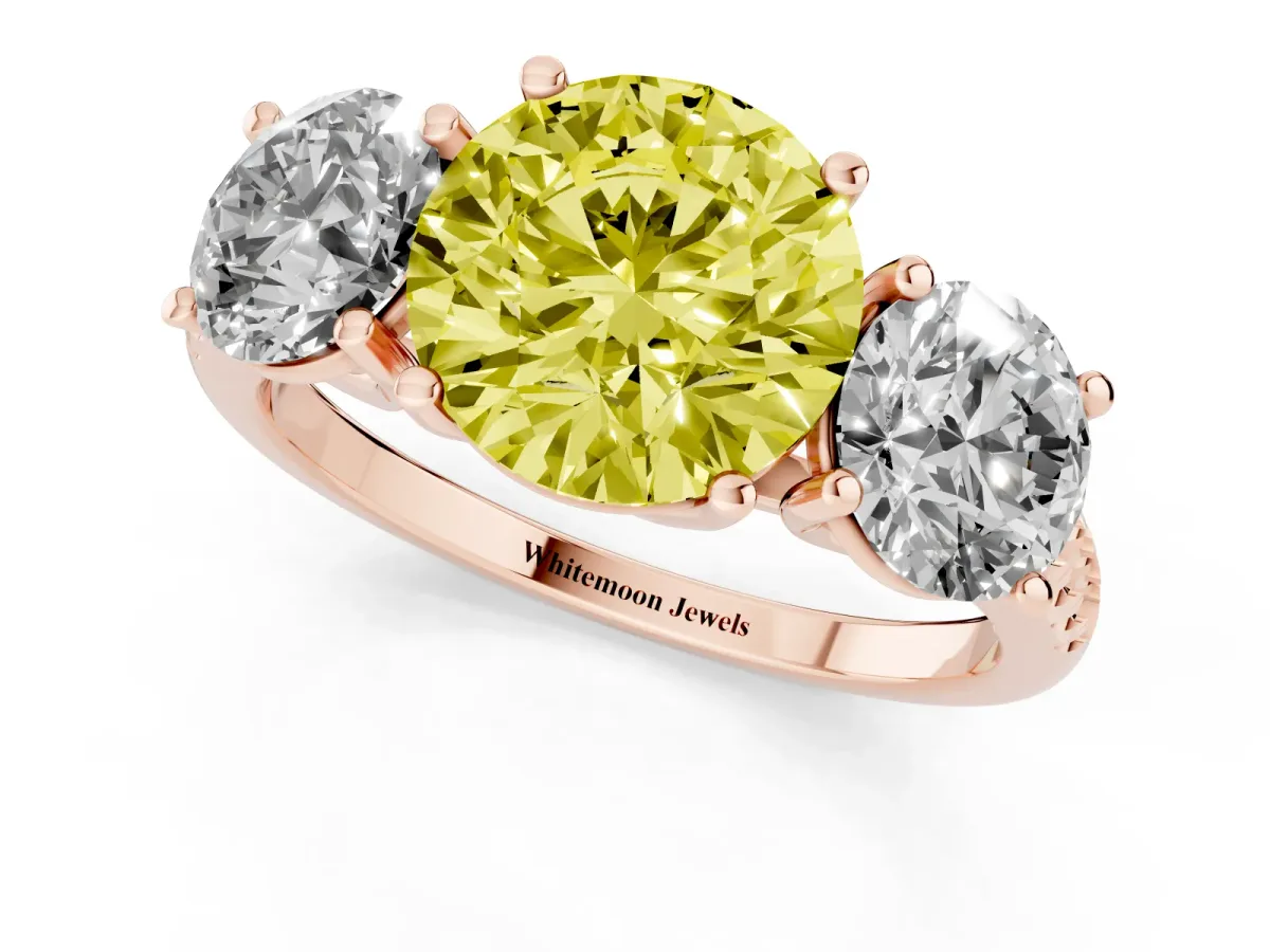 Fancy Yellow Three-Stone Round Cut Diamond Ring with Round Pavé Band and Prong Setting Rose gold