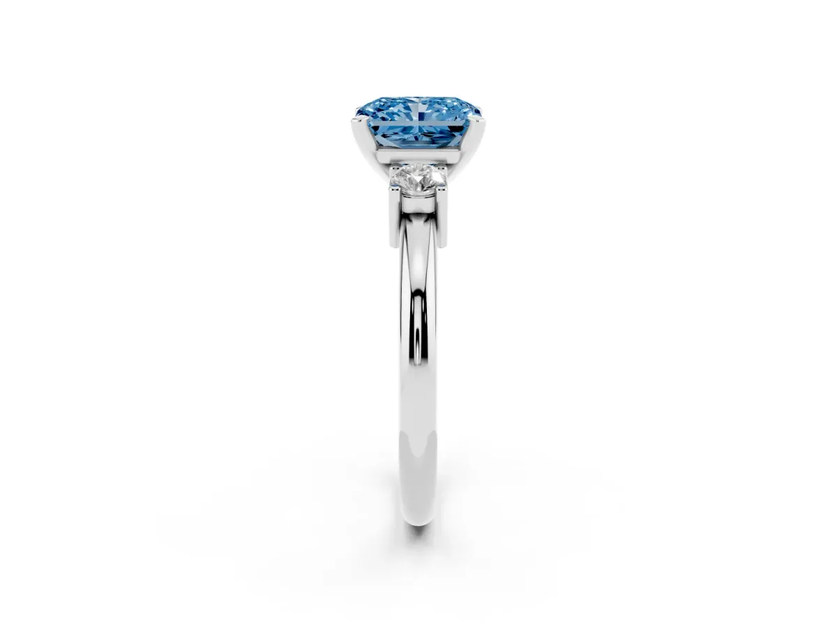 Fancy Blue Three-Stone Radiant Cut Cut Diamond Solitaire with Prong Setting and Classic Band Platinum