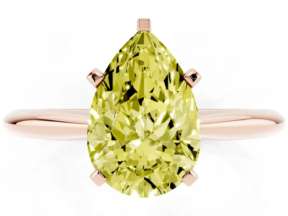 Fancy Yellow Pear Cut Cut Solitaire Ring with Four-Prong Setting on a Classic Band Rose gold