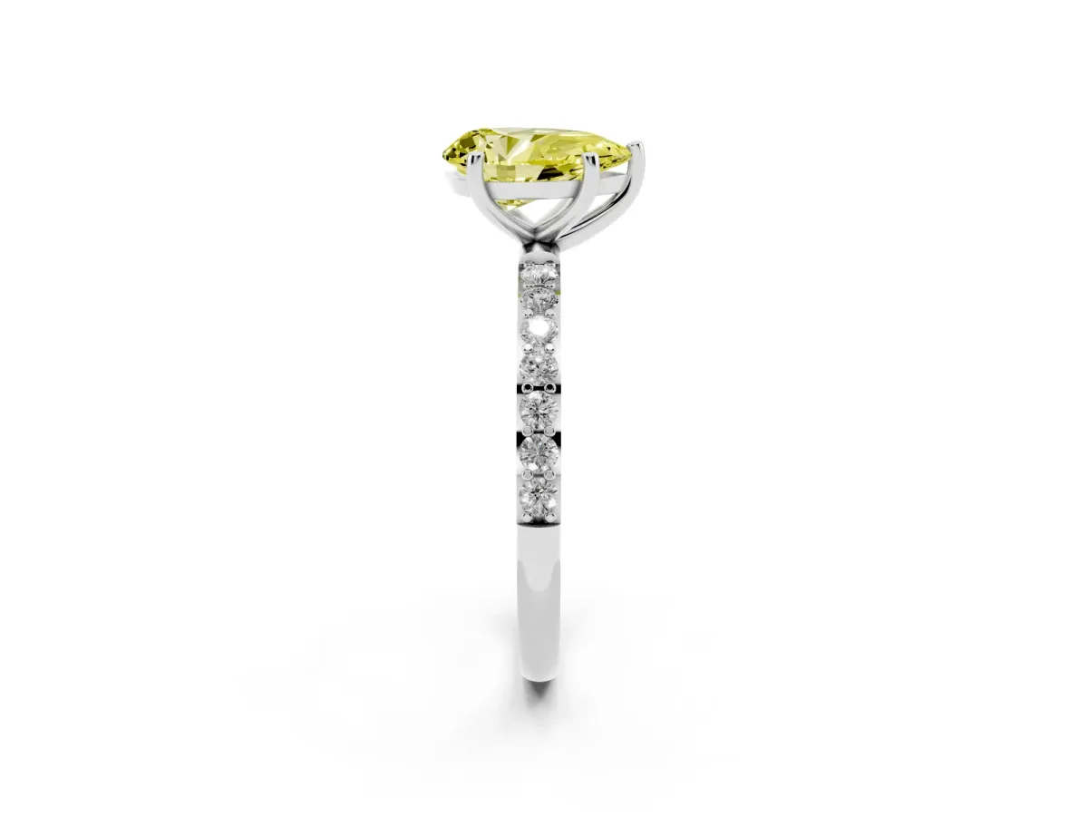 Fancy Yellow Pear Cut Diamond Solitaire Ring with Round Pavé Shoulders and Prong Setting Platinum