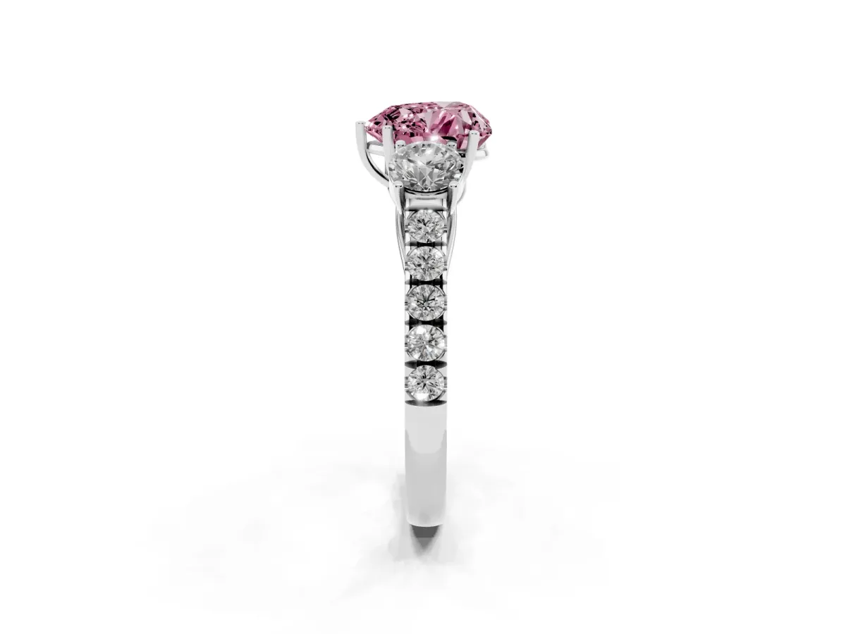 Fancy Pink Heart Cut Cut Diamond Three-Stone Ring with Round Side Stones and Pavé Band Silver