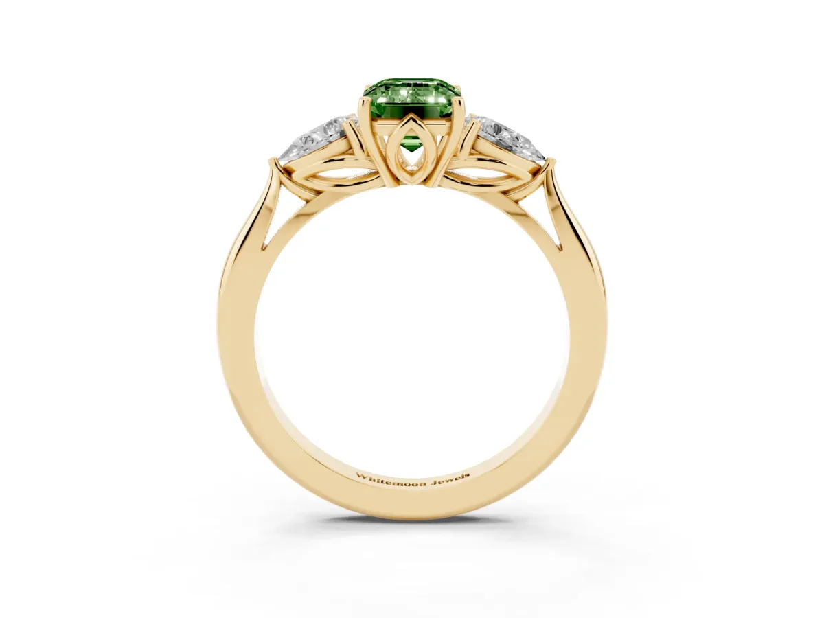 Fancy Green Emerald Cut Diamond Three-Stone Ring with Pear Side Stones and Prong Setting Yellow gold
