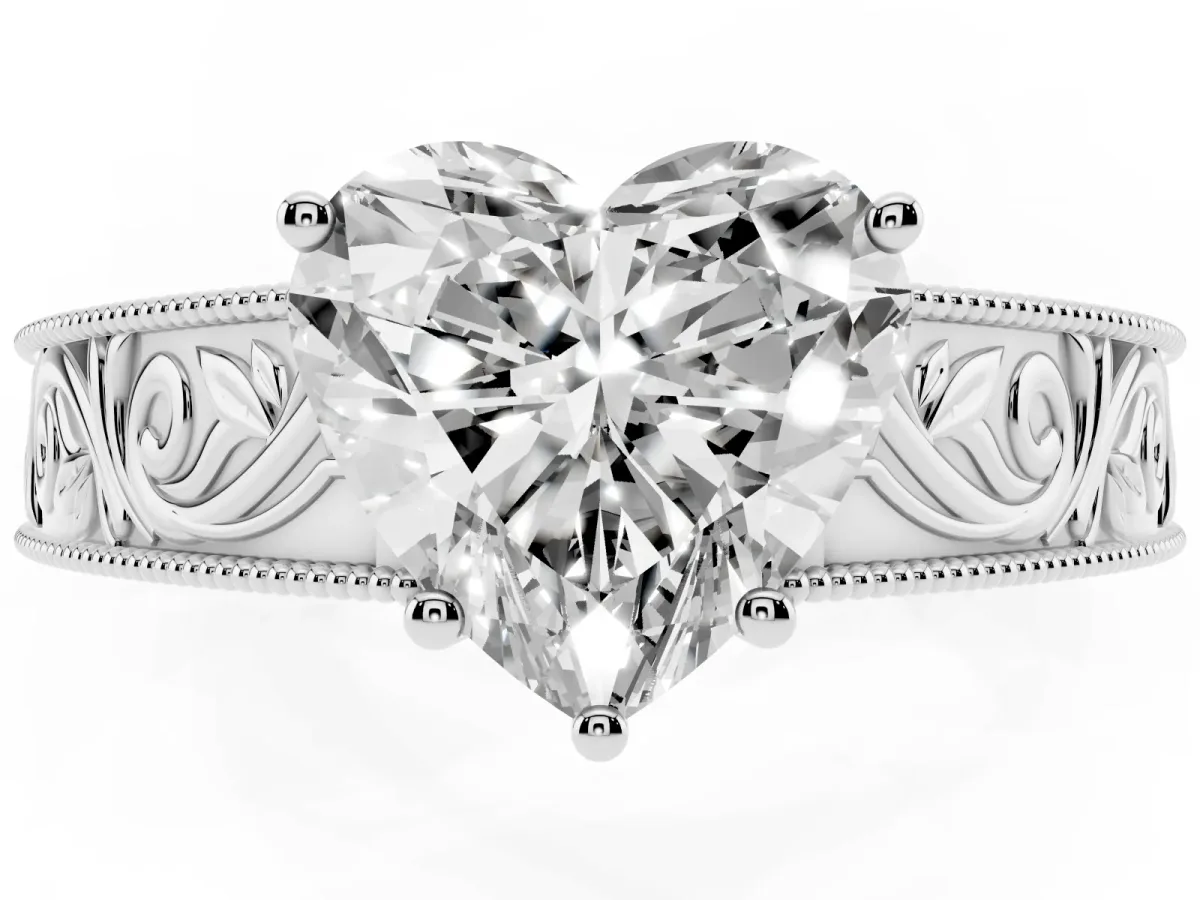 Heart Cut Diamond Solitaire Ring with Engraved Band and Four-Prong Setting White gold