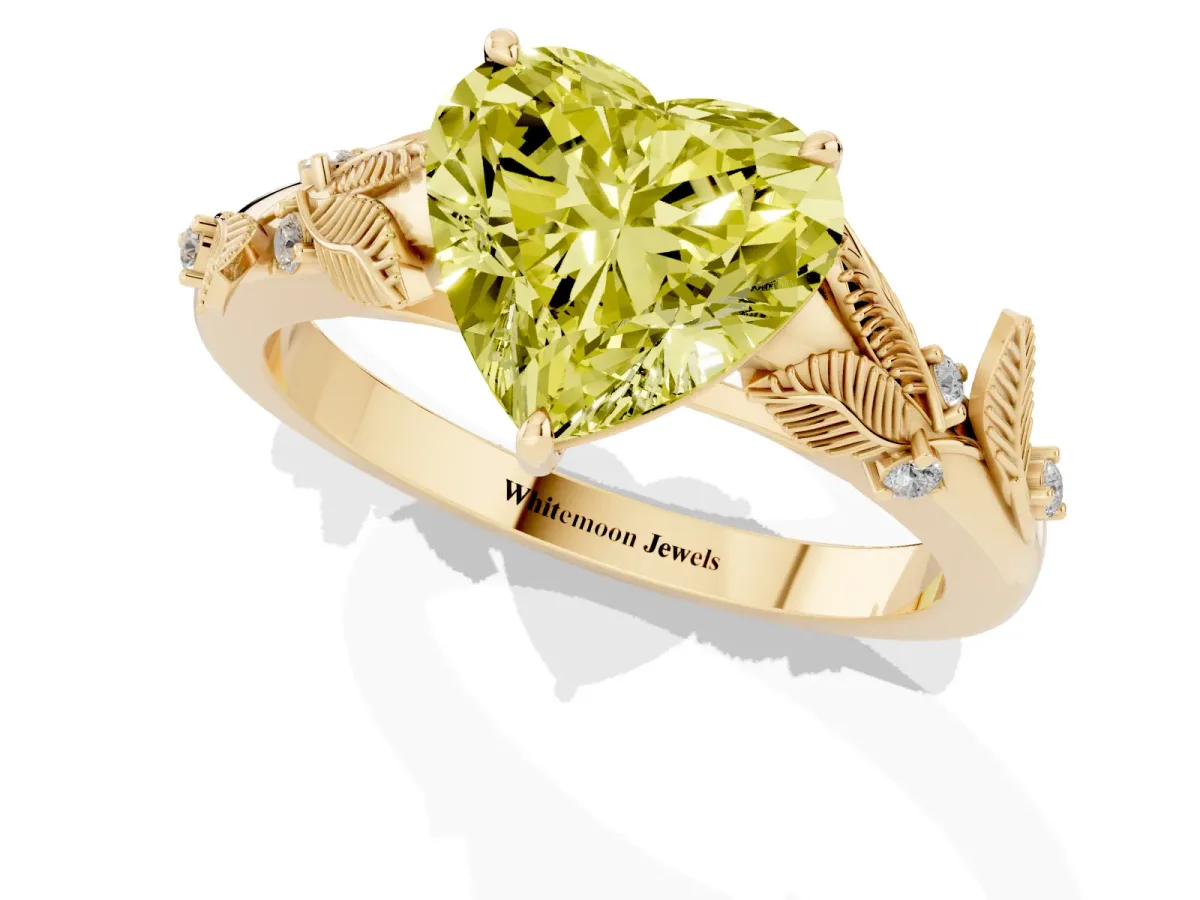 Fancy Yellow Heart Cut Diamond Solitaire Ring with Leaf Motif Band and Four-Prong Setting Yellow gold