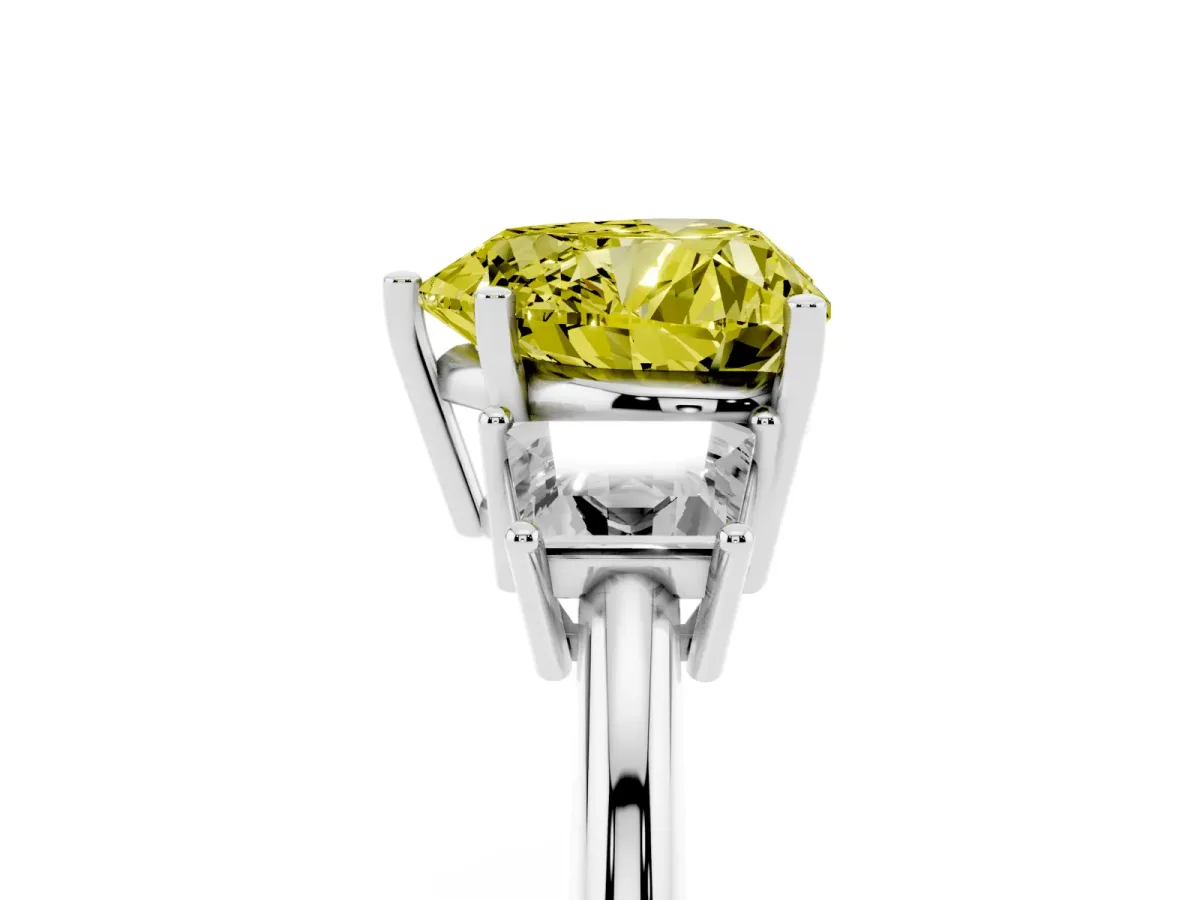 Fancy Yellow Heart Cut Diamond Three-Stone Ring with Trapezoid Side Stones and Prong Setting Silver