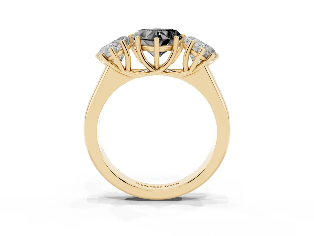 Fancy Black Heart Cut Three-Stone Diamond Ring with Prong Setting on a Classic Band Yellow gold