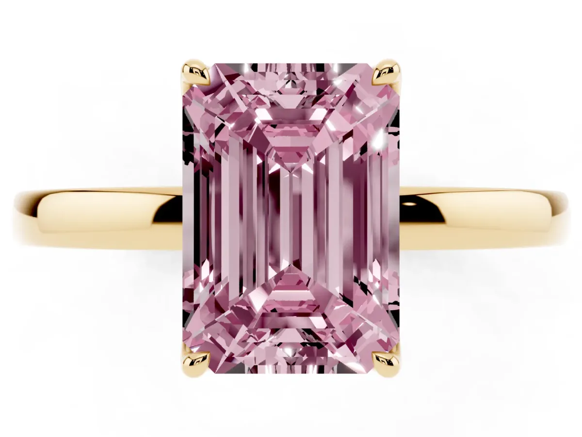 Fancy Pink Emerald Cut Diamond Solitaire Ring with Thin Band and Prong Setting Yellow gold