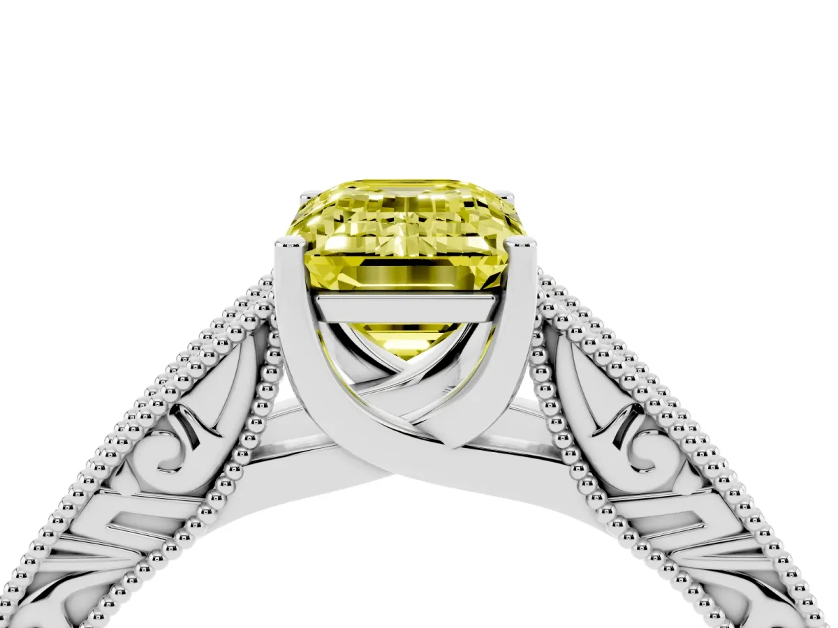 Fancy Yellow Emerald Cut Diamond Solitaire Ring with Engraved Band and Four-Prong Setting Silver