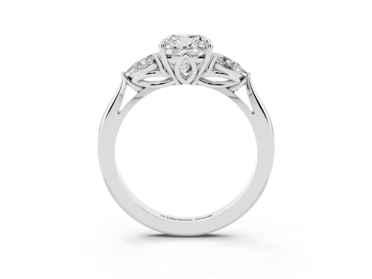 Three-Stone Cushion Cut Diamond Ring with Pear Side Stones in Four-Prong Setting Silver