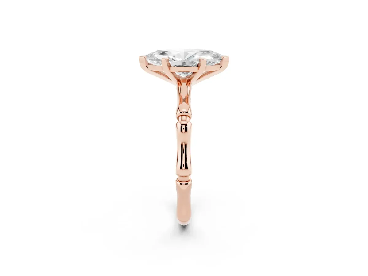 Marquise Cut Solitaire Diamond Ring with Bamboo Band and Four-Prong Setting Rose gold