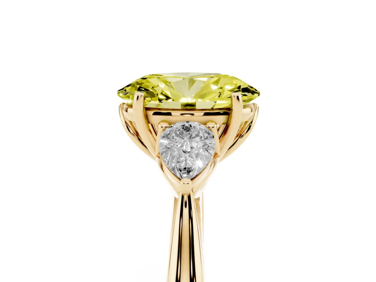 Fancy Yellow Three-Stone Oval Cut Diamond Ring with Pear Side Stones in Four-Prong Setting Yellow gold