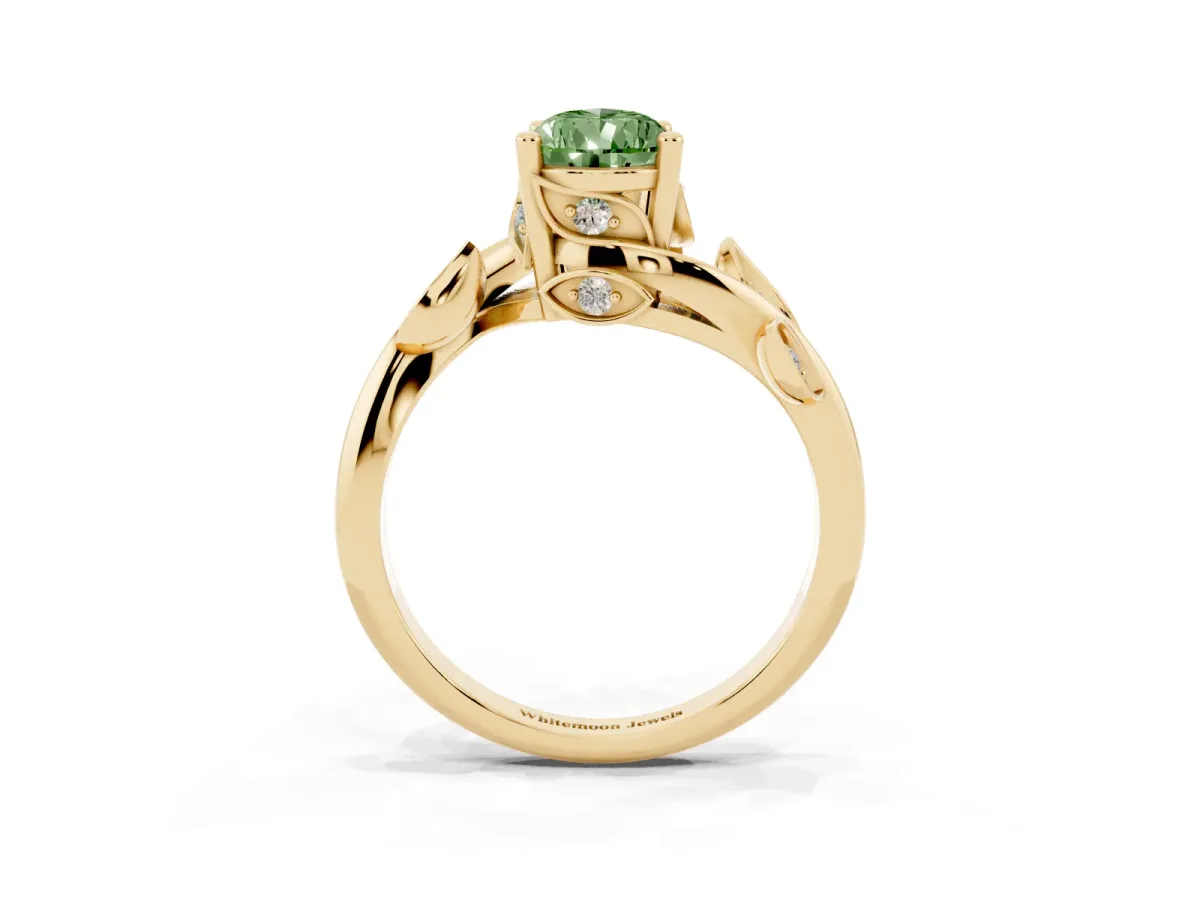 Fancy Green Pear Cut Solitaire Twist Engagement Ring with Leaf Accents and Prong Setting Yellow gold