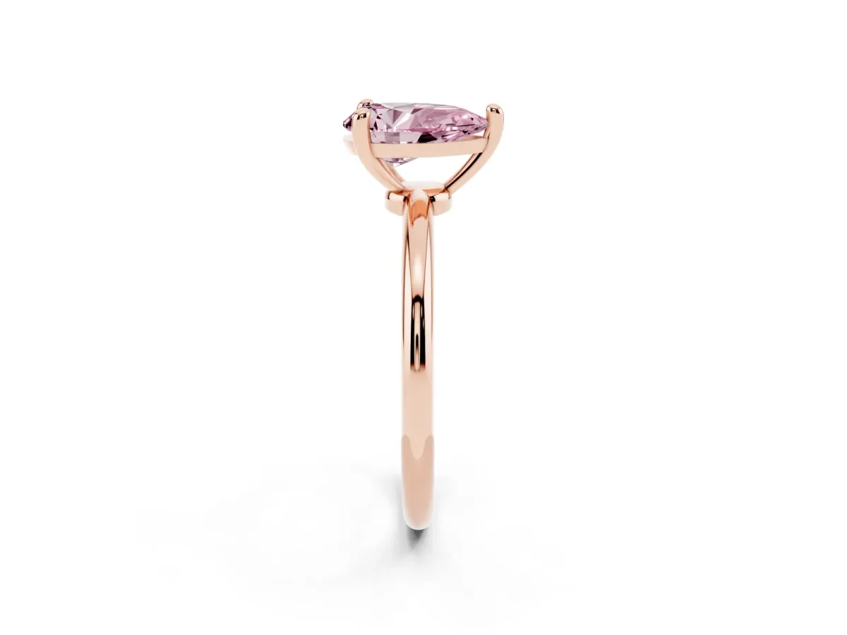 Fancy Pink Pear Cut Solitaire Diamond Ring with 4-Prong Setting on a Classic Band Rose gold