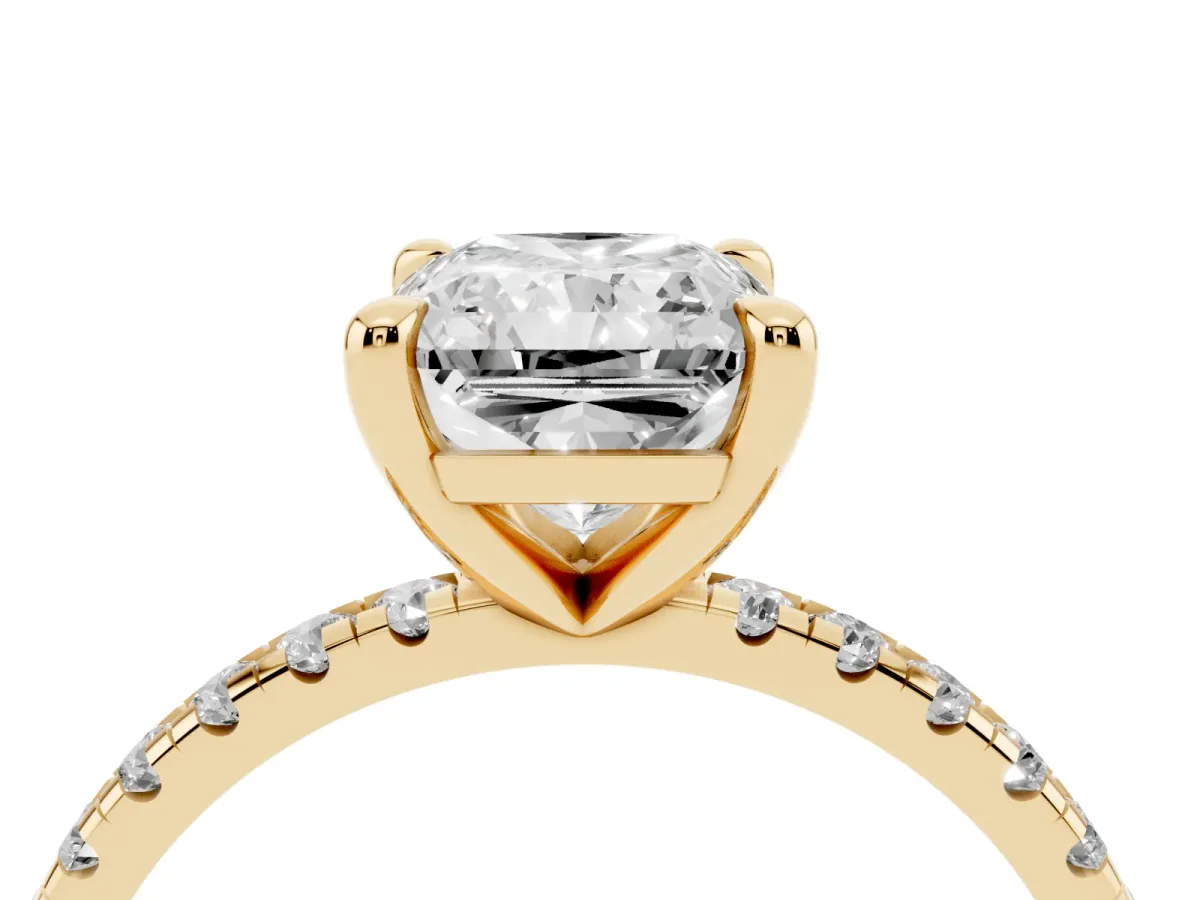 Radiant Cut Diamond Brilliant Solitaire Ring with Pavé Band and Four-Prong Setting Yellow gold