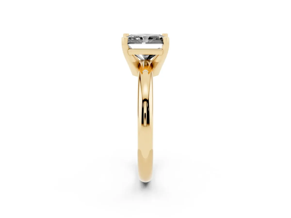 Fancy Black Radiant Cut Diamond Solitaire Engagement Ring with Round Band and Four-Prong Setting Yellow gold