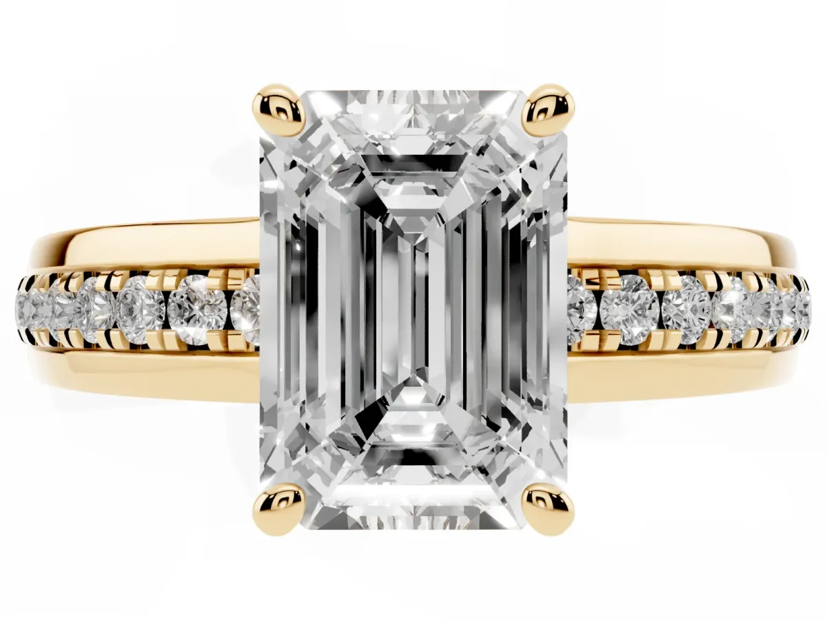 Emerald Cut Solitaire Diamond Ring with Channel Set Band and Six-Prong Setting Yellow gold